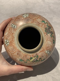A Chinese wucai 'flying horse' jar, a green-enamelled yellow-ground 'dragon' vase and a Nanking crackle-glazed jar, 19th C.