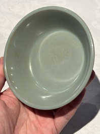 A pair of Chinese Longquan celadon saucers, Song/Yuan