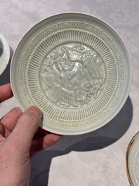 A pair of Chinese qingbai 'crane' plates and a tea bowl with stand, Song/Yuan