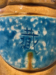 A large Chinese sancai-glazed Buddha, possibly from the Chengde Palace, Qianlong