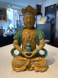 A large Chinese sancai-glazed Buddha, possibly from the Chengde Palace, Qianlong