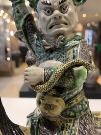 A fine Chinese verte biscuit sculpture of a Heavenly King on horseback, 19th C.