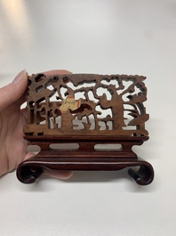 A Chinese octagonal gilt-lacquered wooden stand and four wooden carvings on stands, 19th C.