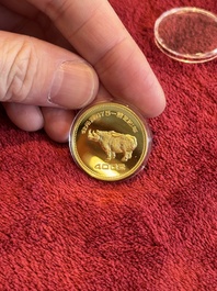 Four Chinese gold coins commemorating archeological discoveries from the Bronze Age, 1981