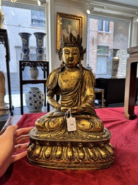 A large Sino-Tibetan gilt bronze Buddha, Xuande mark, possibly Ming
