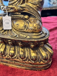 A large Sino-Tibetan gilt bronze Buddha, Xuande mark, possibly Ming