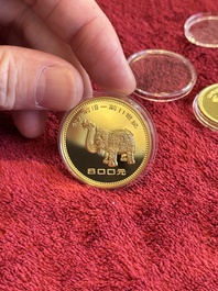 Four Chinese gold coins commemorating archeological discoveries from the Bronze Age, 1981