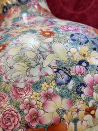 A large Chinese famille rose 'millefleurs' 'tianqiuping' vase, Qianlong mark, 20th C.