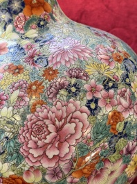A large Chinese famille rose 'millefleurs' 'tianqiuping' vase, Qianlong mark, 20th C.