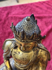 A large Sino-Tibetan gilt bronze Buddha, Xuande mark, possibly Ming