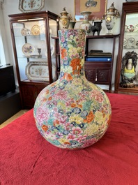 A large Chinese famille rose 'millefleurs' 'tianqiuping' vase, Qianlong mark, 20th C.