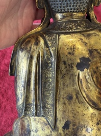 A large Sino-Tibetan gilt bronze Buddha, Xuande mark, possibly Ming
