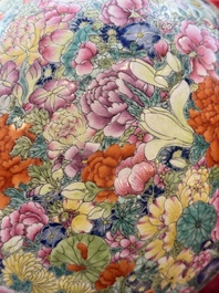 A large Chinese famille rose 'millefleurs' 'tianqiuping' vase, Qianlong mark, 20th C.