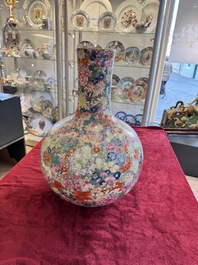A large Chinese famille rose 'millefleurs' 'tianqiuping' vase, Qianlong mark, 20th C.