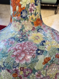 A large Chinese famille rose 'millefleurs' 'tianqiuping' vase, Qianlong mark, 20th C.
