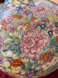 A large Chinese famille rose 'millefleurs' 'tianqiuping' vase, Qianlong mark, 20th C.