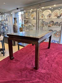 A Chinese famille rose turquoise-ground 'flower scrolls and bats' plaque, later mounted as table, Qianlong