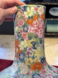 A large Chinese famille rose 'millefleurs' 'tianqiuping' vase, Qianlong mark, 20th C.