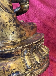 A large Sino-Tibetan gilt bronze Buddha, Xuande mark, possibly Ming