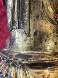 A large Sino-Tibetan gilt bronze Buddha, Xuande mark, possibly Ming