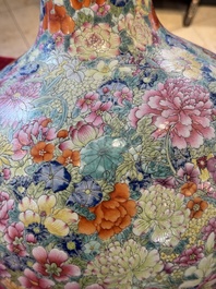 A large Chinese famille rose 'millefleurs' 'tianqiuping' vase, Qianlong mark, 20th C.