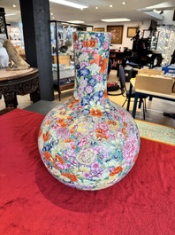 A large Chinese famille rose 'millefleurs' 'tianqiuping' vase, Qianlong mark, 20th C.