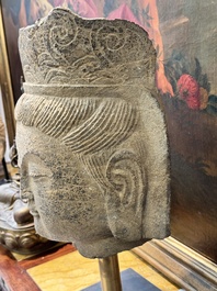 A Chinese stone head of Guanyin, Song/Ming