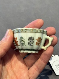 Two small Chinese famille verte handled cups with 'prunus on cracked ice' and 'shou' design, Kangxi