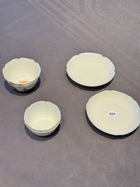A pair of Chinese eggshell white-glazed cups and saucers, and two famille rose cups, 18th C.