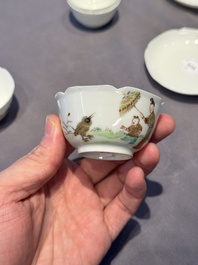 A pair of Chinese eggshell white-glazed cups and saucers, and two famille rose cups, 18th C.