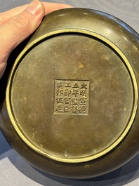 A Chinese bronze censer with lion-form handles, 大明宣德五年監造工部官監吳邦佐造 mark, 18th C.
