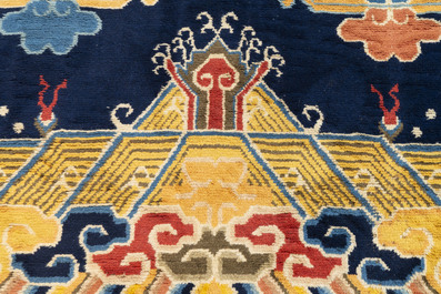 A Sino-Tibetan inscribed woollen 'dragon' pillar carpet, 19th C.