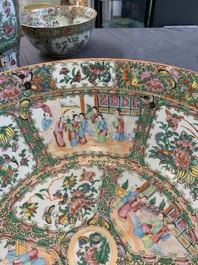 A Chinese Canton famille rose covered vase and two bowls, 19th C.