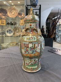 A Chinese Canton famille rose covered vase and two bowls, 19th C.