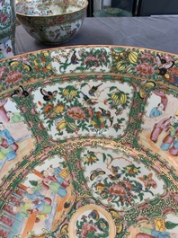 A Chinese Canton famille rose covered vase and two bowls, 19th C.