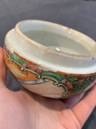A Chinese Canton famille rose covered vase and two bowls, 19th C.
