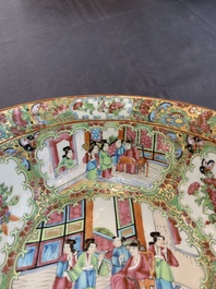 A Chinese Canton famille rose covered vase and two bowls, 19th C.