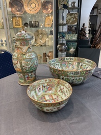 A Chinese Canton famille rose covered vase and two bowls, 19th C.