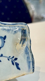 A blue and white Dutch Delft inkwell with pocket watch holder, 18th C.