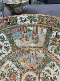 A Chinese Canton famille rose covered vase and two bowls, 19th C.