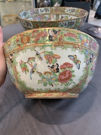A Chinese Canton famille rose covered vase and two bowls, 19th C.