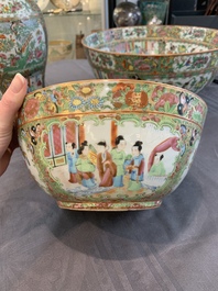 A Chinese Canton famille rose covered vase and two bowls, 19th C.