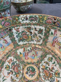 A Chinese Canton famille rose covered vase and two bowls, 19th C.