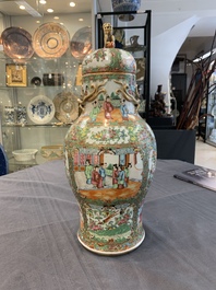 A Chinese Canton famille rose covered vase and two bowls, 19th C.