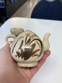A Chinese Cizhou peach-shaped 'Lian Zhong San Yuan 連仲三元' ewer, Yuan/Ming