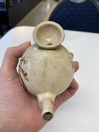 A Chinese Cizhou peach-shaped 'Lian Zhong San Yuan 連仲三元' ewer, Yuan/Ming
