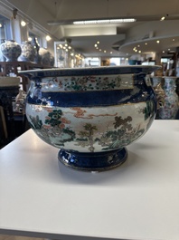 A pair of large Chinese famille verte powder-blue-ground 'landscape' jardini&egrave;res, 19th C.
