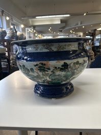 A pair of large Chinese famille verte powder-blue-ground 'landscape' jardini&egrave;res, 19th C.