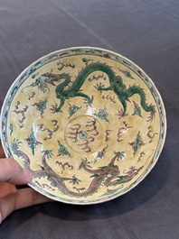 A pair of Chinese famille noire 'dragon' bowls, Wanli mark, 19th C.