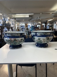 A pair of large Chinese famille verte powder-blue-ground 'landscape' jardini&egrave;res, 19th C.